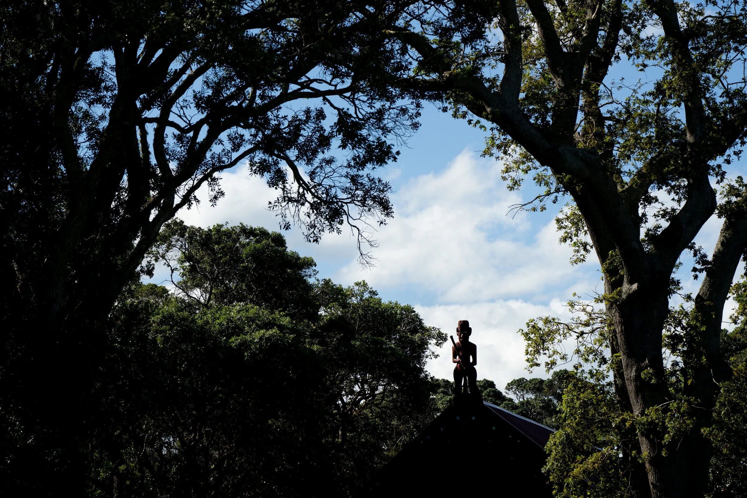 The tekoteko, or carved figure atop the Wharenui (meeting house), on the Upper Marae at Waitangi.