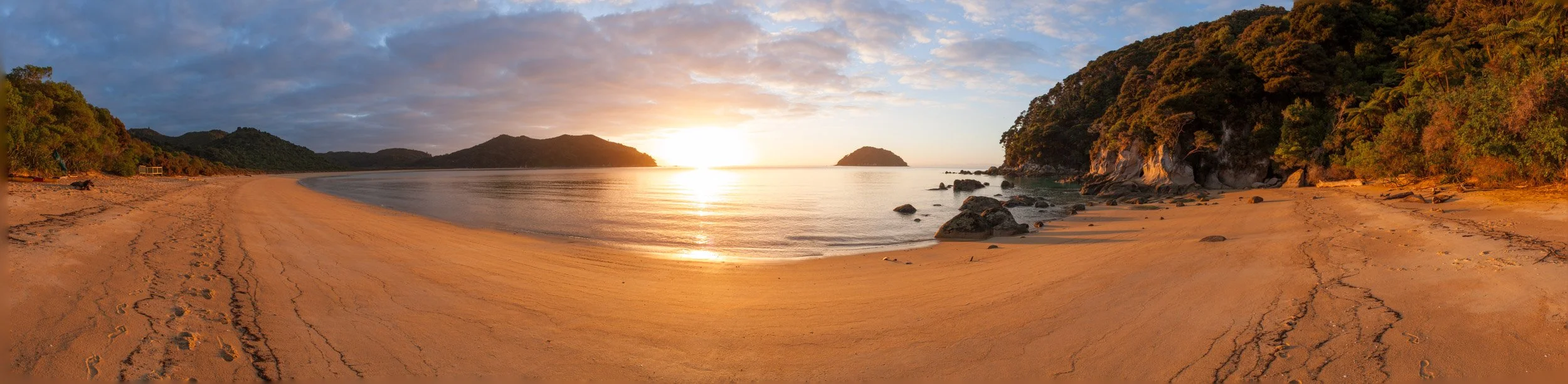 Sunrise panorama of Onetahuti Bay.
