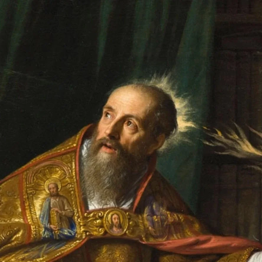 A man with a long beard dressed in ornate religious robes with gold details and religious icons, appearing to be set in a historical or religious context, looking upwards with a solemn expression.