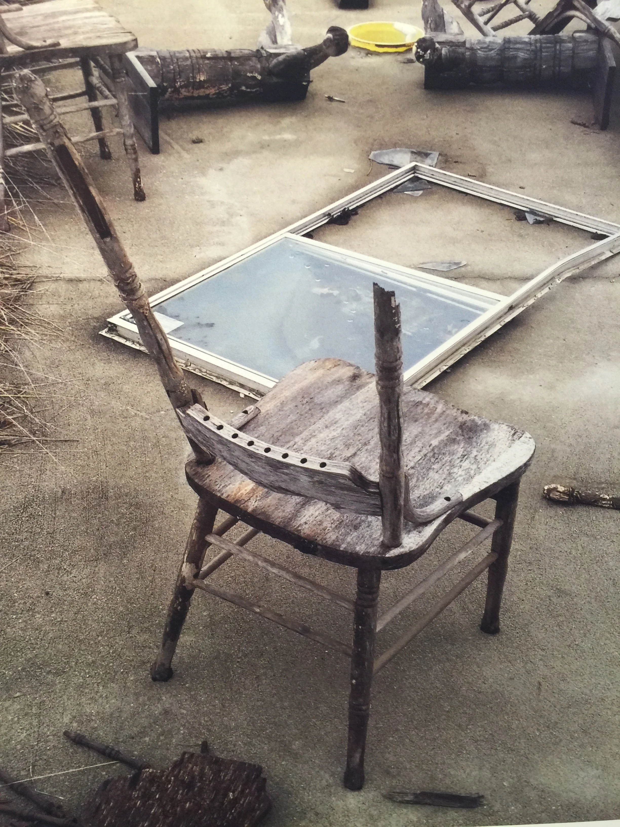  "Am. Destroyed." Triptych Center Panel.

I drove past this destruction for twenty years.
Boards broken.
Chairs upside down.
The outline of a life erased.

Never knowing it was Me.

A tornado did this.
No warning. No mercy.
Just wind and violence and