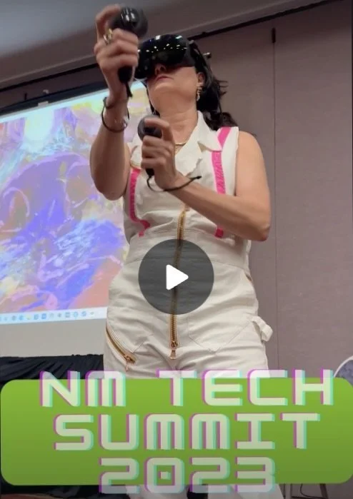 Robbi Firestone performs in Mixed Reality, wearing her virtual reality headset for the New Mexico Technology Summit. She then held a Q&A section where audience members asked about creating fine art in virtual reality.