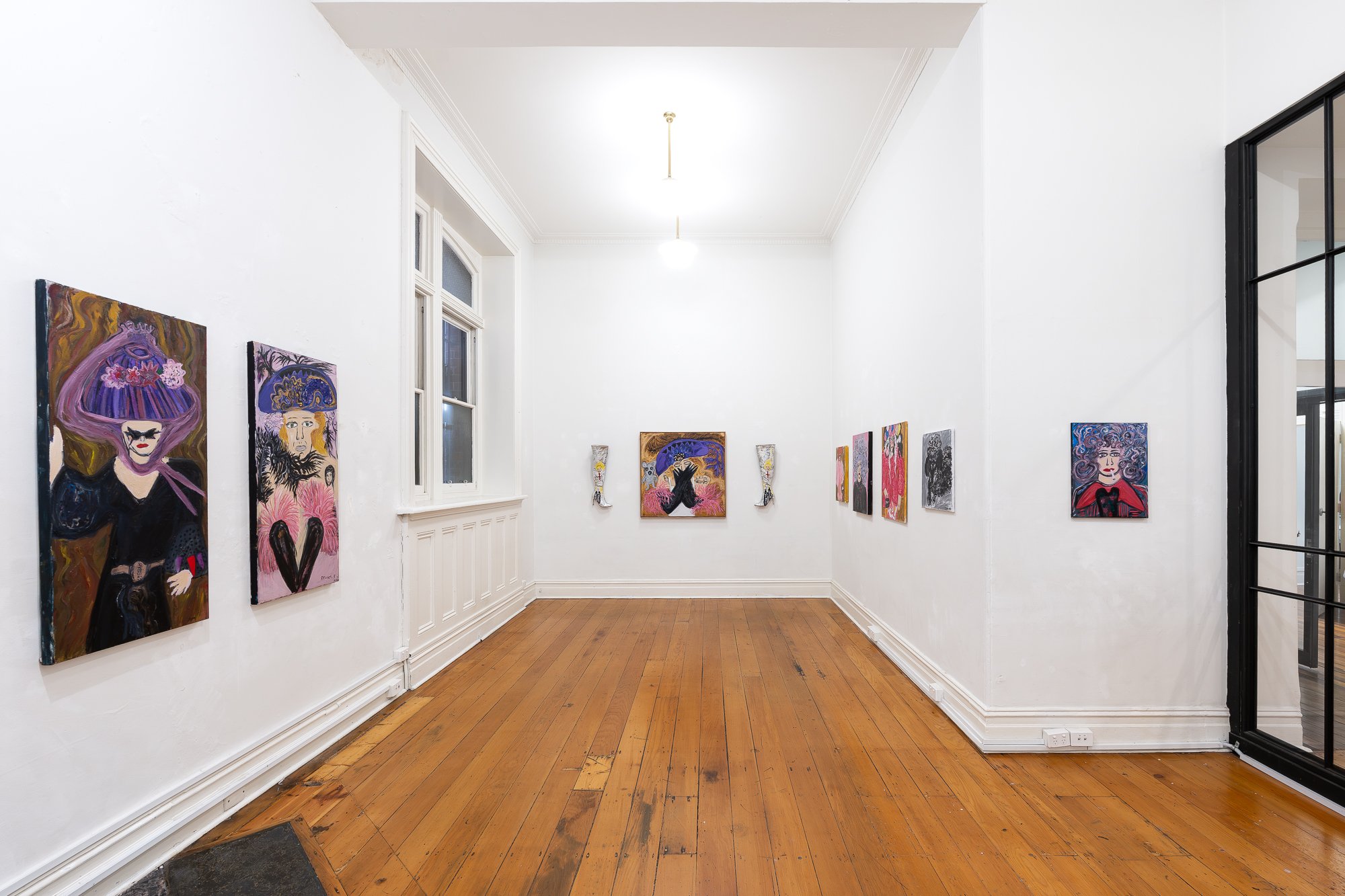 Installation image of artworks from Maya Taman's solo I Ain't No Fancy Bird
