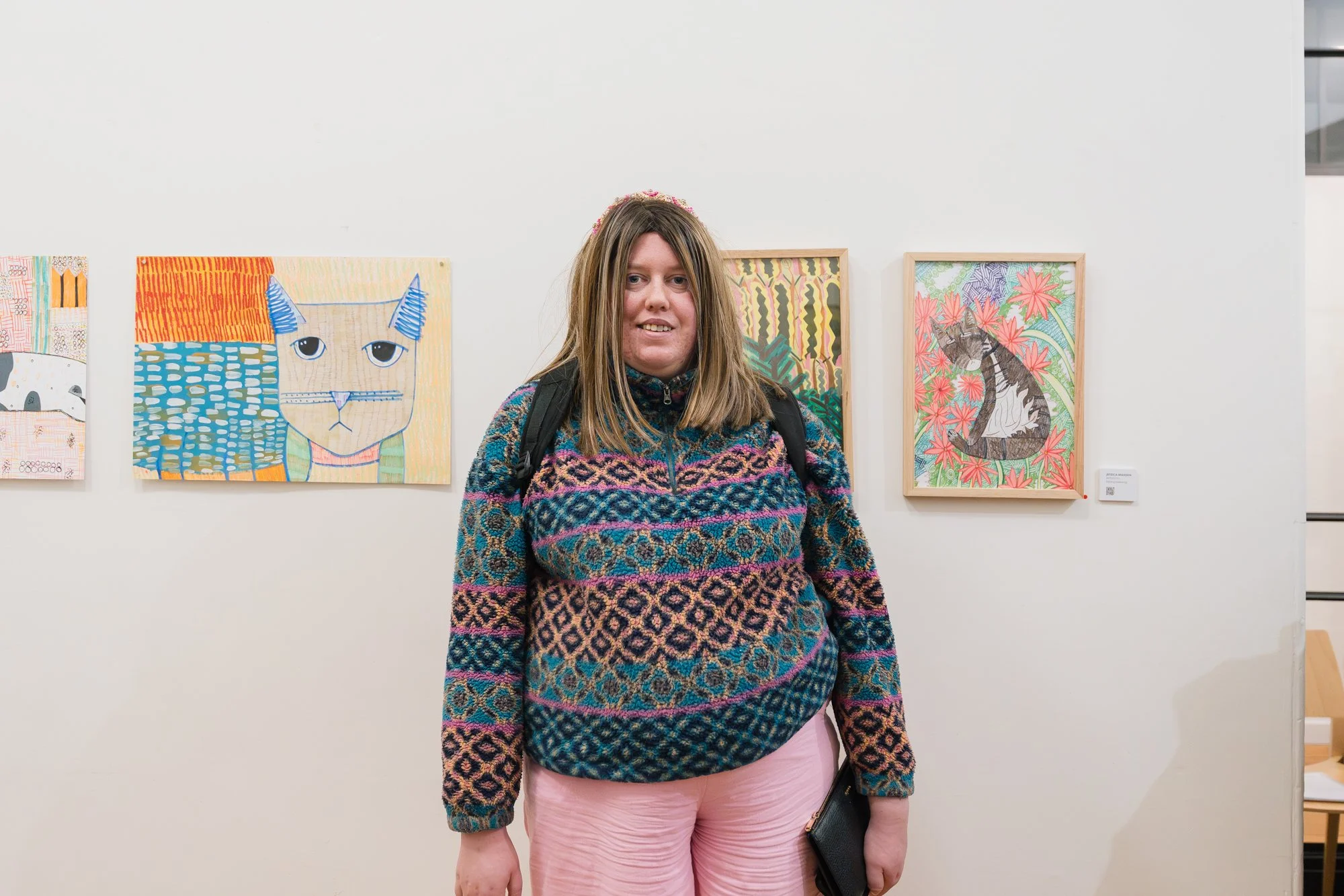 Opening of Convergence 2025 with artist Jess Madden in a light filled gallery space.