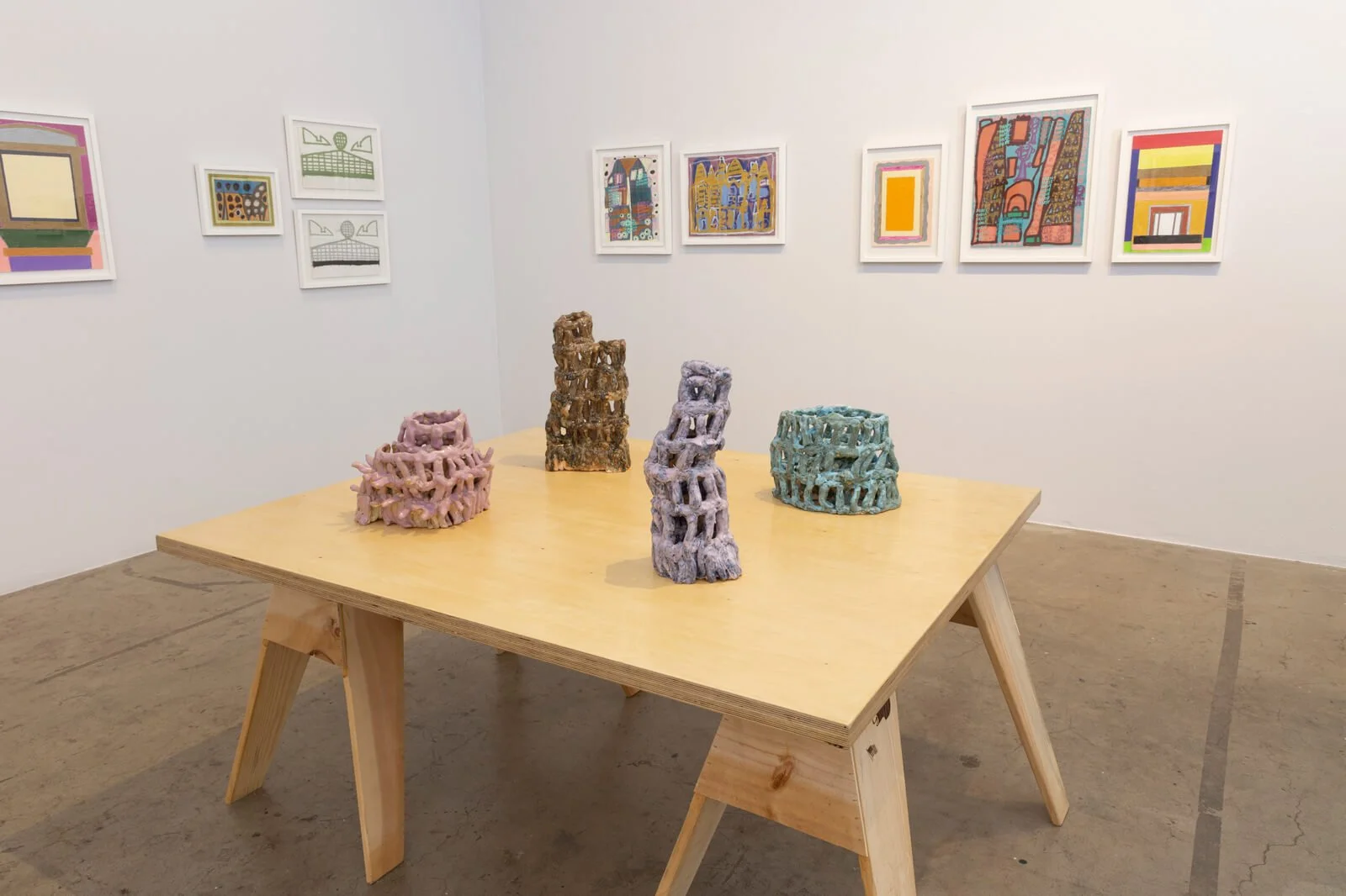 Image of a gallery space with ceramic and framed artworks Tierra del Sol, West Hollywood