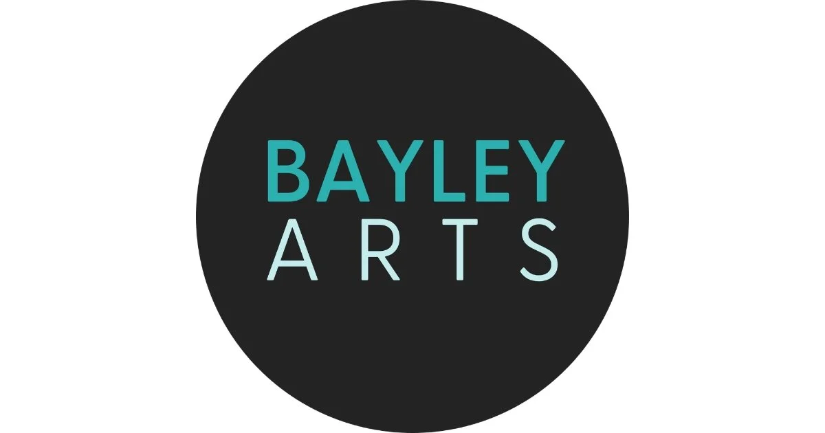 Black circle with the text "BAYLEY ARTS" in blue and white letters