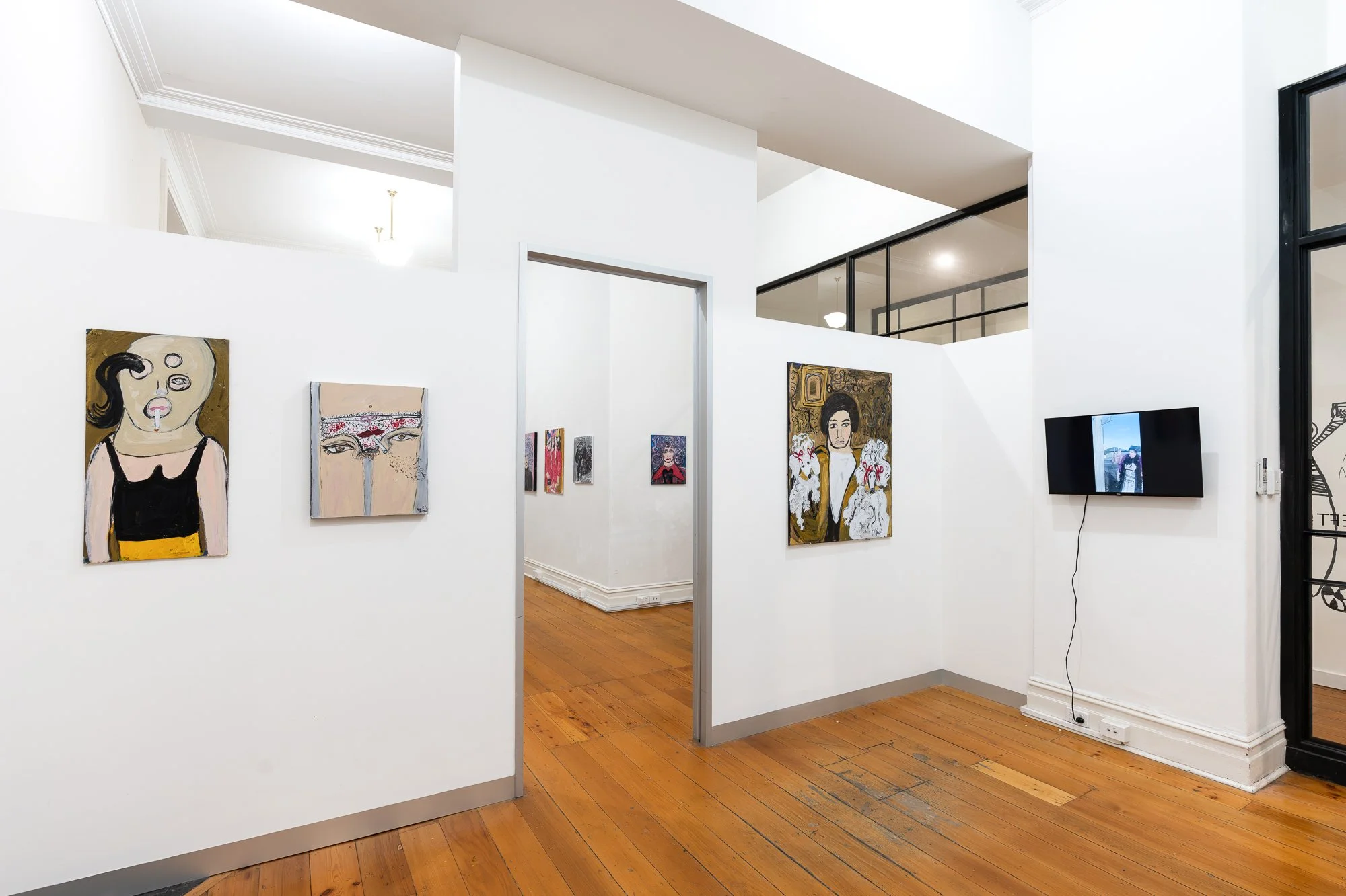 Installation image of artworks from Maya Taman's solo I Ain't No Fancy Bird