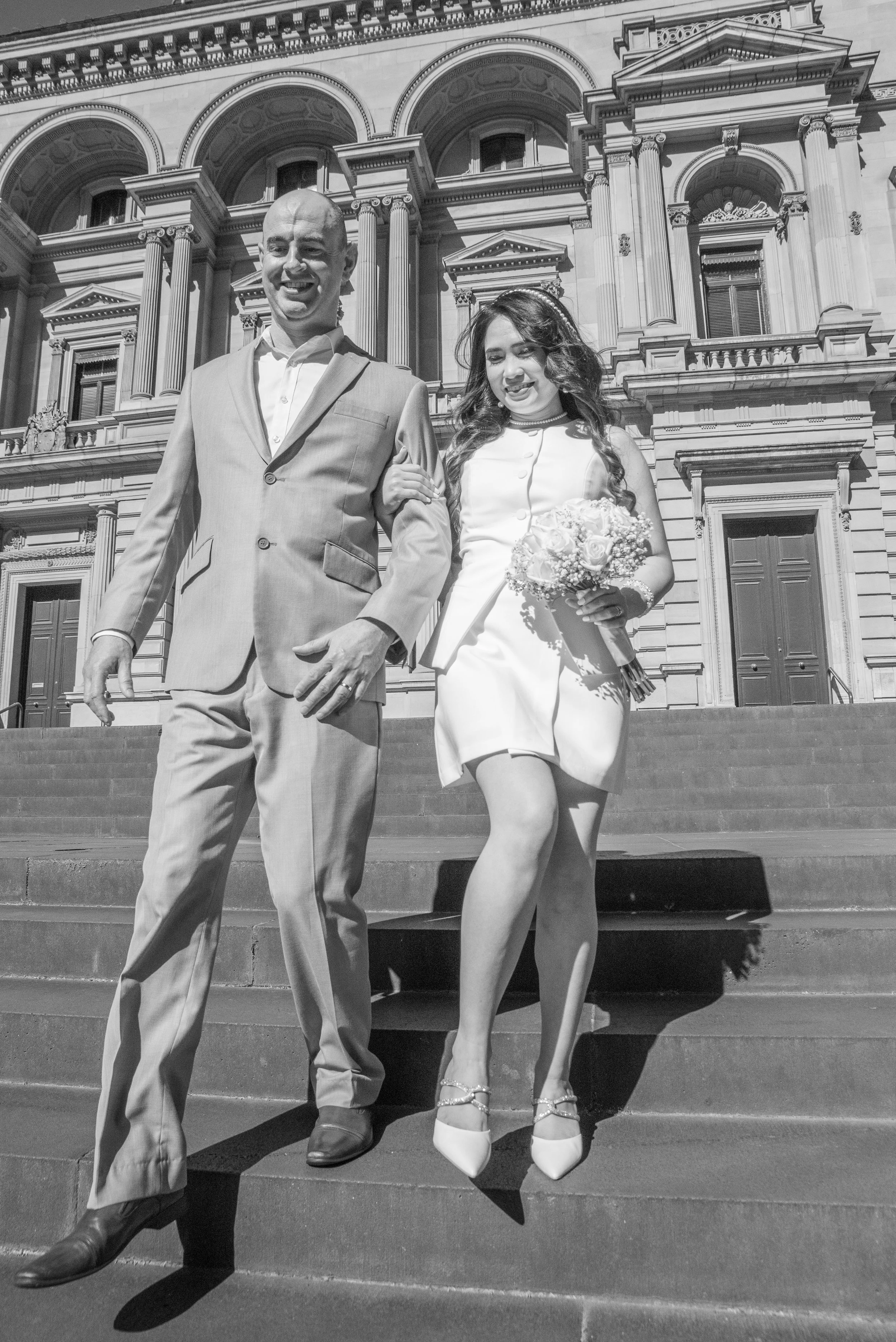 Just married – A joyful candid photograph of Fatima and David immediately after their wedding ceremony.