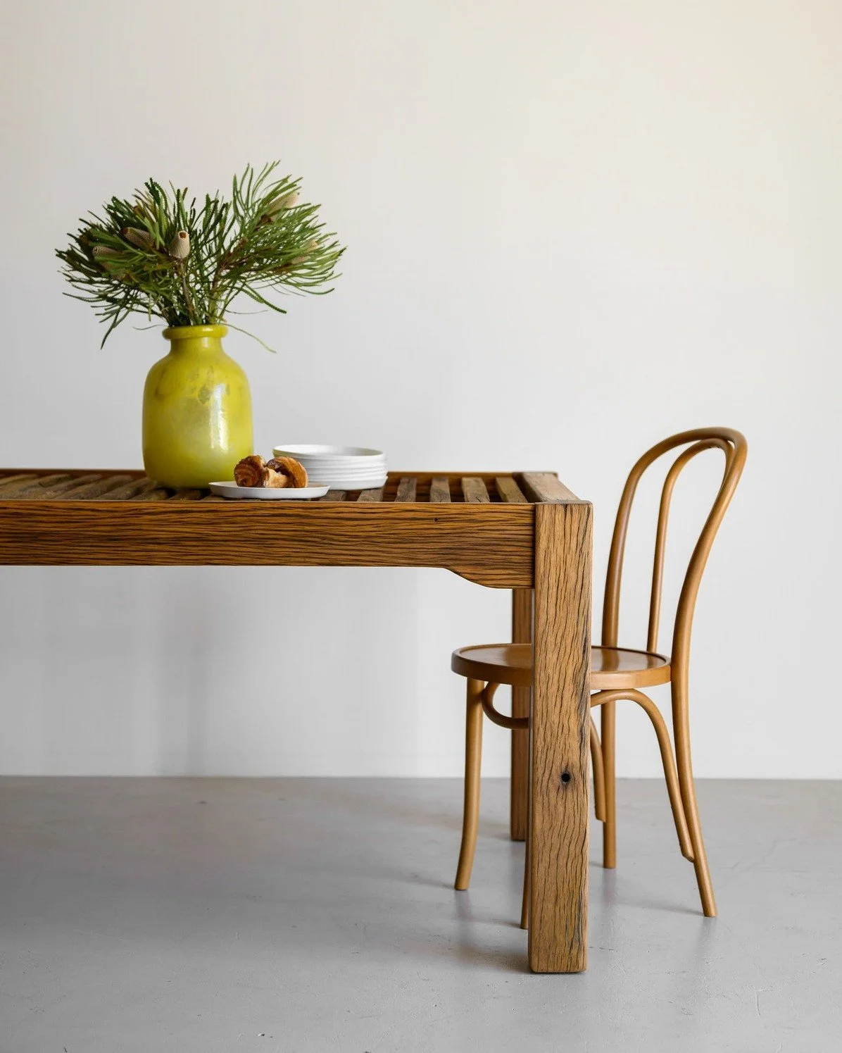 WOOL DINING TABLE | Version .25 crafted from Woolloomooloo wharf timber framing and authentic hardwood sheering shed slats. New features include a more robust 70x130mm frame and two new finish options. Pictured in the deep rustic finish with images o