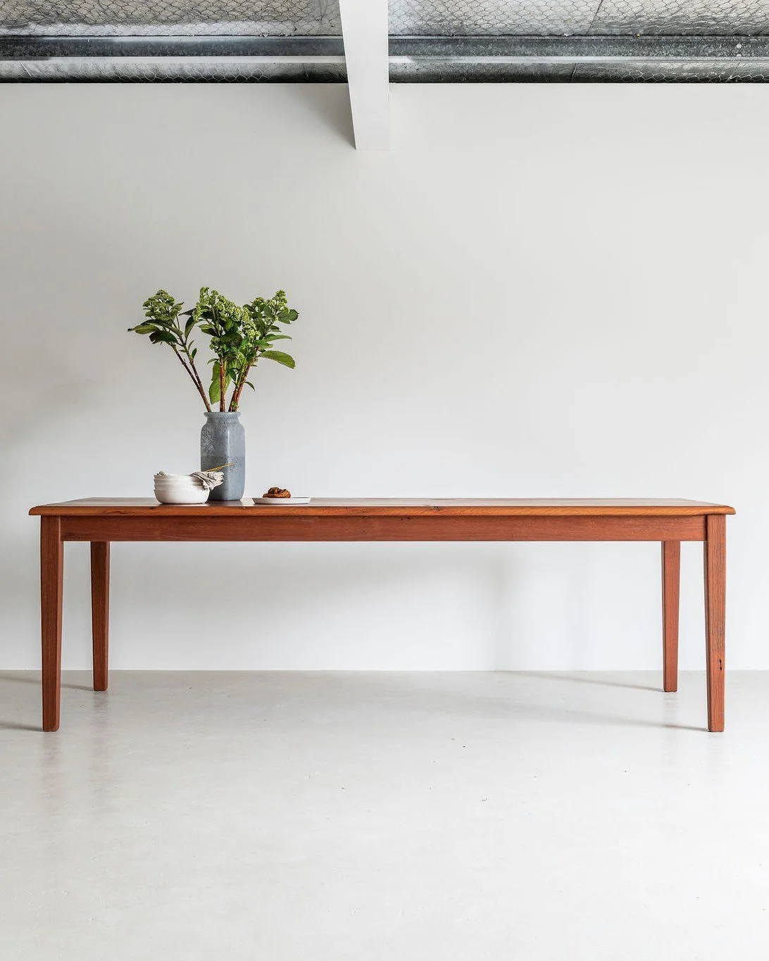 LILLIAN | Dining Table in Ironbark

A refined Du Pont edge profile adds depth without ornament. Crafted from recycled Australian Ironbark, Lillian feels warm, honest and beautifully tactile.

Made to order in your choice of bespoke timbers.