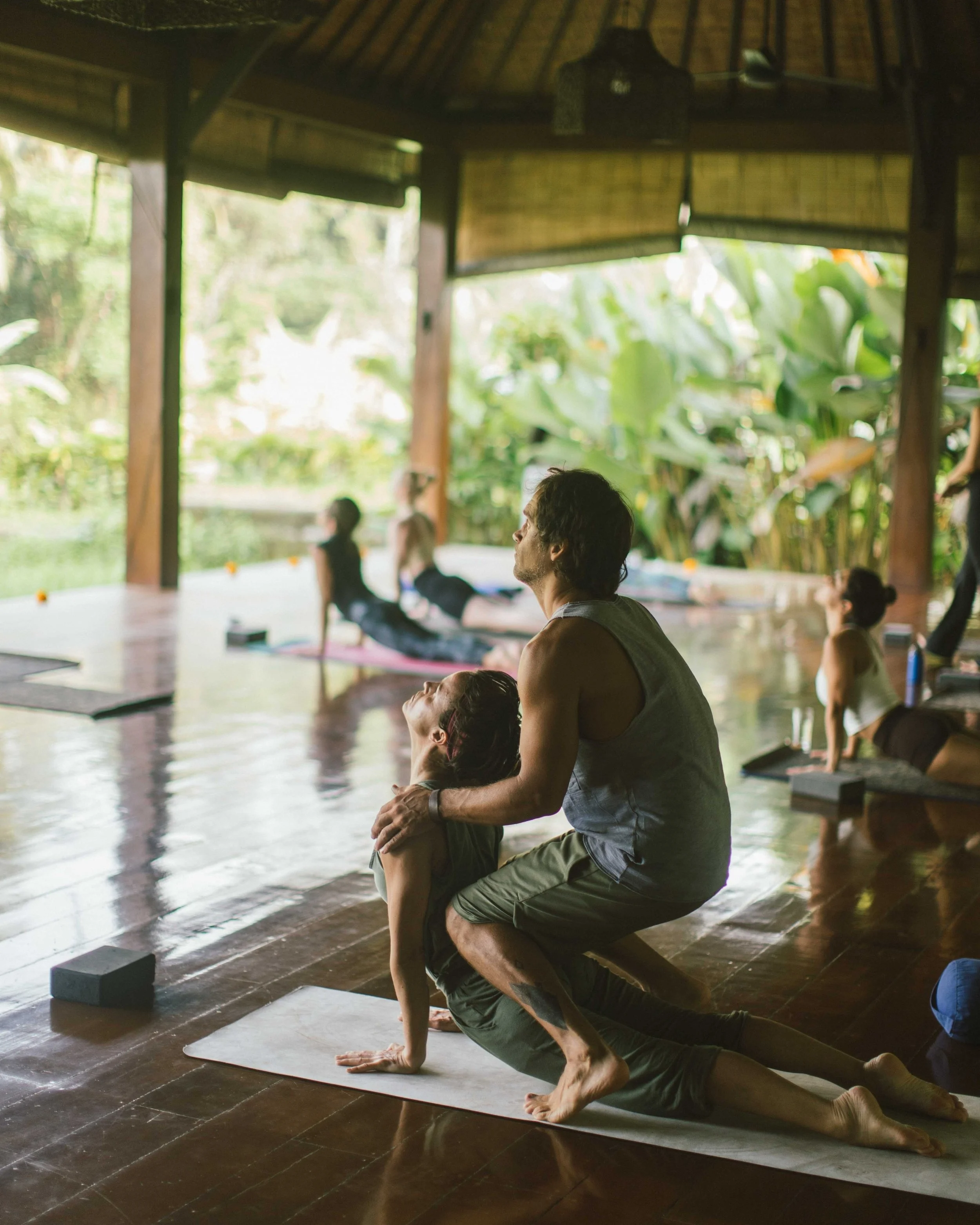 There&rsquo;s something special about a well-placed, intentional hands-on adjustment in yoga.

We&rsquo;ve both had moments in our own practices where a teacher&rsquo;s touch completely shifted our experience &mdash;helping us find more ease, better 