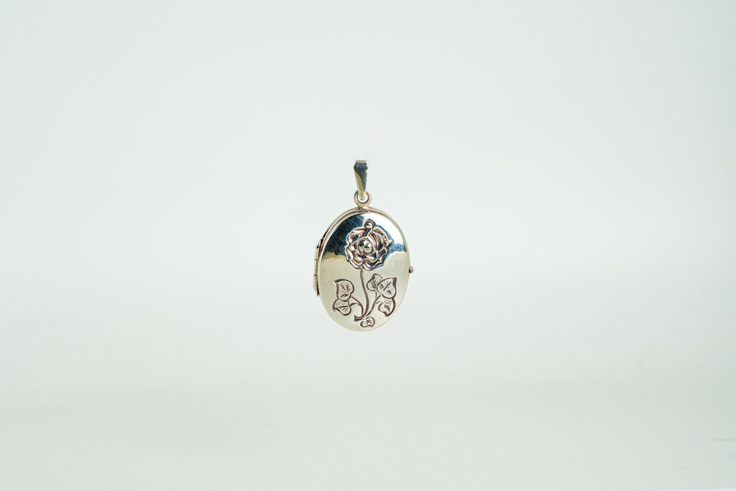 Sterling Silver Floral Oval Locket Pendant