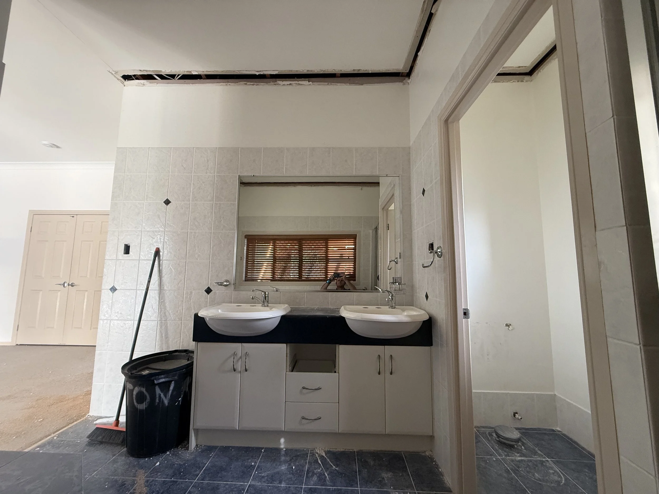 Bathroom renovation before construction, showing the original vanity and fittings in this Wellington Point home.