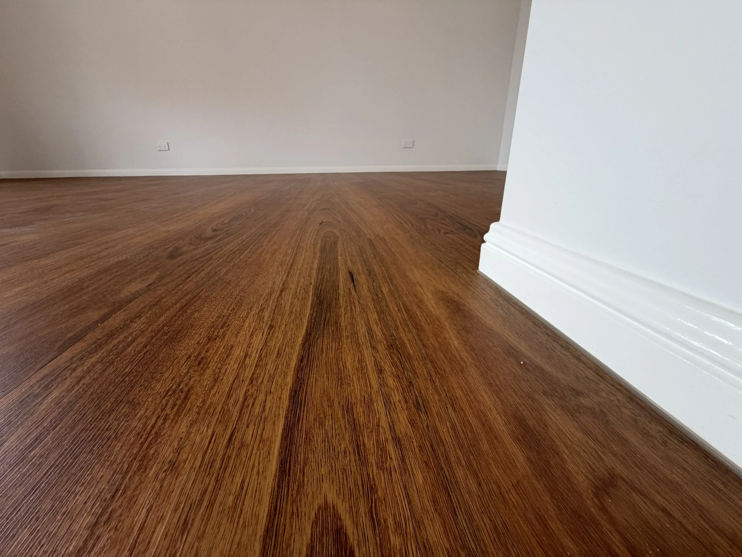 Queensland Spotted Gum luxury vinyl plank flooring installed during a Wellington Point home renovation by Kingston Renovations.