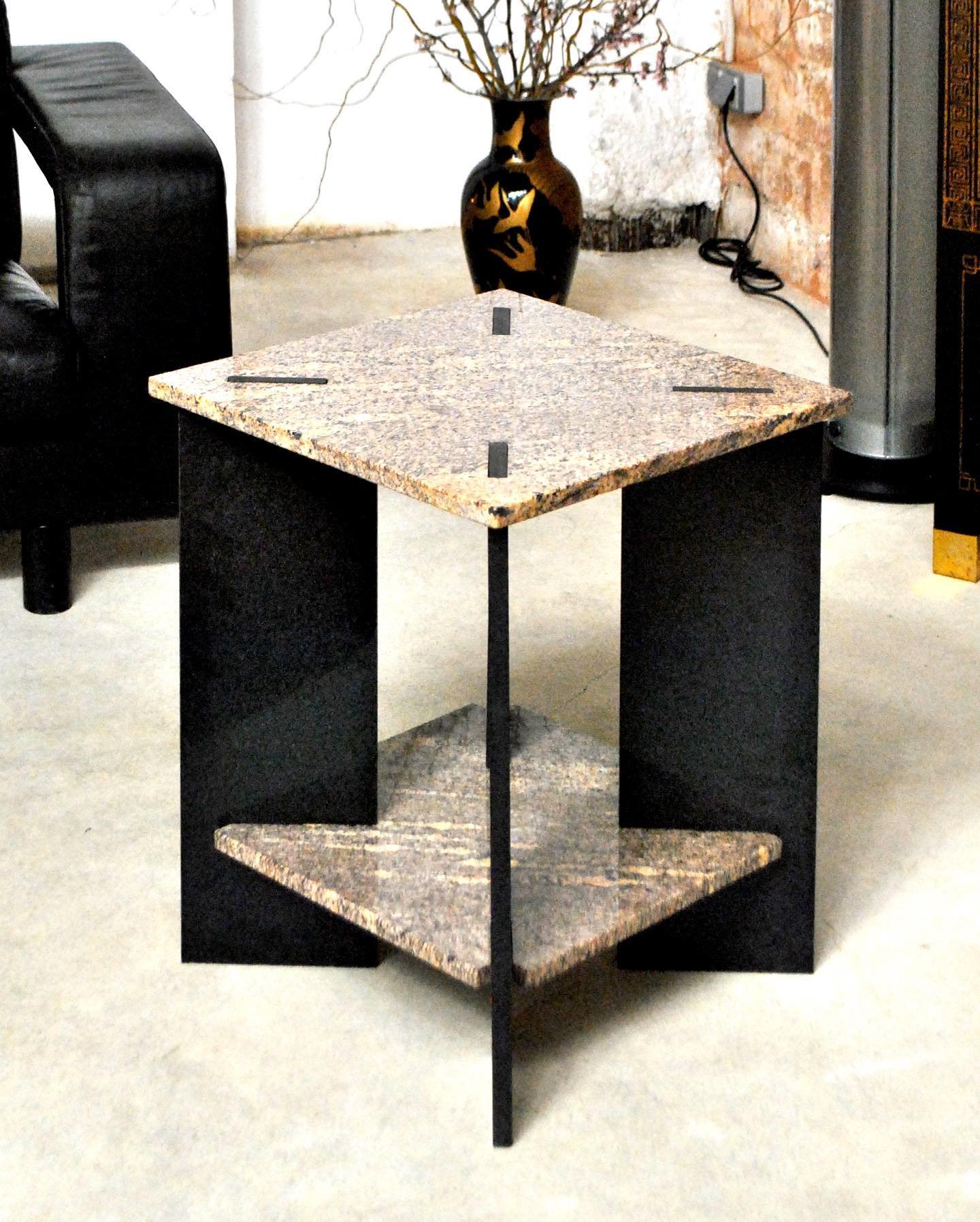 &lsquo;Scarto&rsquo; side table. 
Made from our reclaimed Marcino and black granite. To achieve this dry join design the offcuts have been waterjet cut for a high accuracy finish. 
So satisfying to see disregarded pieces of natural stone saved from w