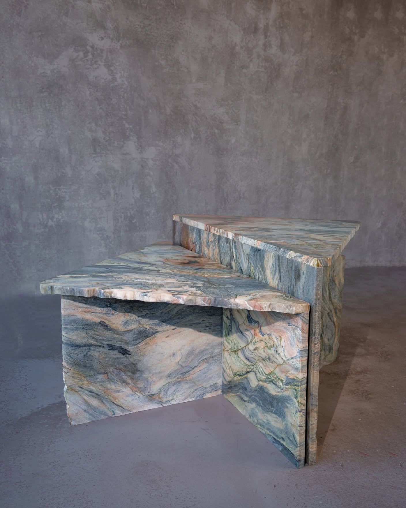 Our two-part Rift Table was crafted entirely from offcuts of Fusion quartzite, a striking Brazilian natural stone.
The size and shape of each piece guided the final form &mdash; a design that celebrates imperfection and chance.
Working with the freef