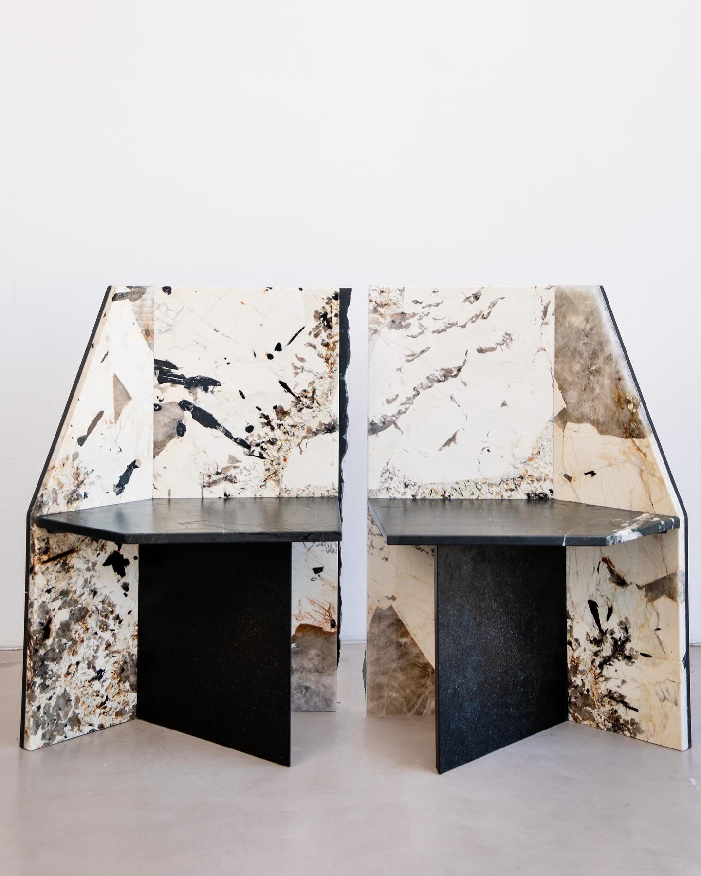 Pair of Fracture chairs, designed for a hotel lobby, combining the abstract expressionism of the Patagonia marble with a solid Basalt structure.

Crafted entirely from reclaimed natural stone offcuts, each piece tells a unique story. 

One of our mos