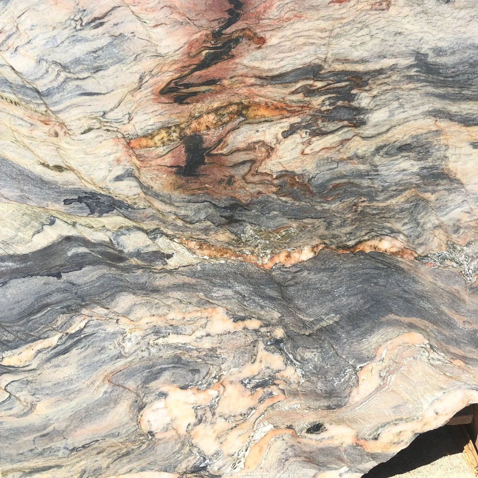 Working with reclaimed stone means listening to what already exists. The broken edges and flowing veining of fusion quartzite offcuts became the starting point &mdash; shaping the final design of this table.

Made possible thanks to @pedres_nobles ex