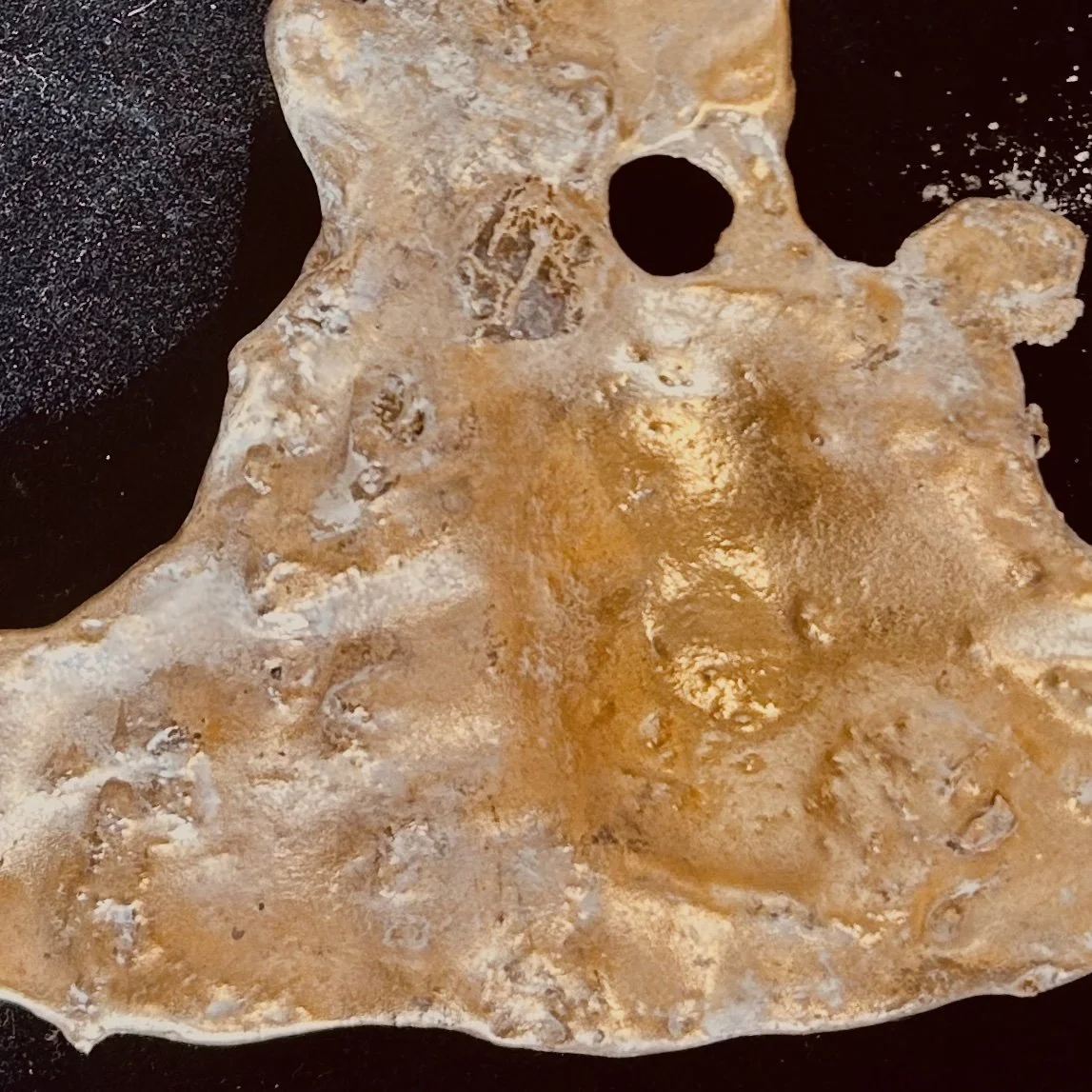 A molten piece of bronze