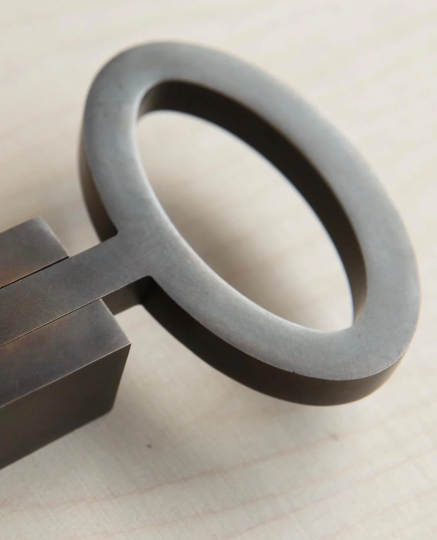 A contemporary oval brass door handle.  Clean lines create an understated, elegant and entirely bespoke piece.⁠
⁠