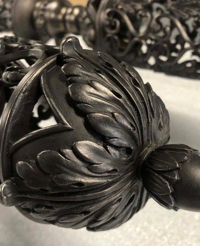 Part of a bronze Rococo wall light.  The dark black finish has been achieved through patination, and will continue to age beautifully. ⁠
⁠