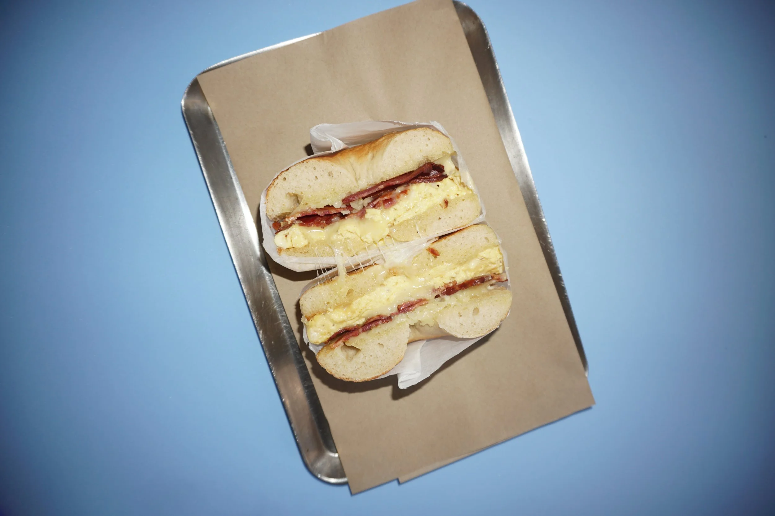 Colorful Aesthetic Bacon Egg and Cheese Bagel from Rhodo Bagels- the Best Bagels in Lisbon Containers