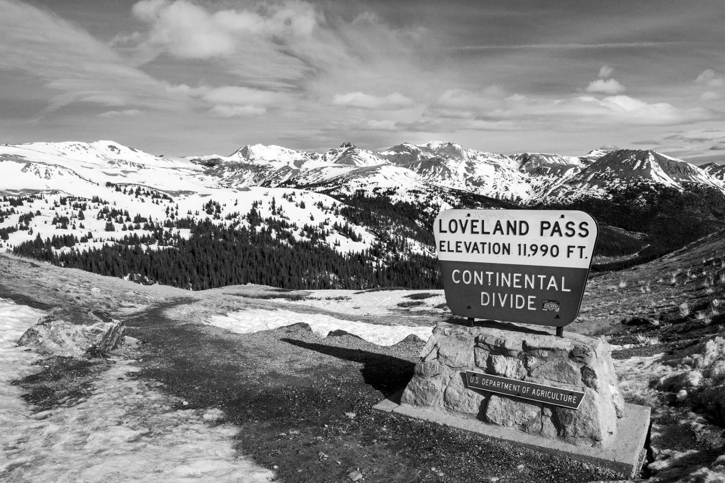 Loveland Pass — High above the world below standing on top of Loveland Pass makes this Country so grand. Driving up the two lane highway you find the peace on top of the many Colorado roads