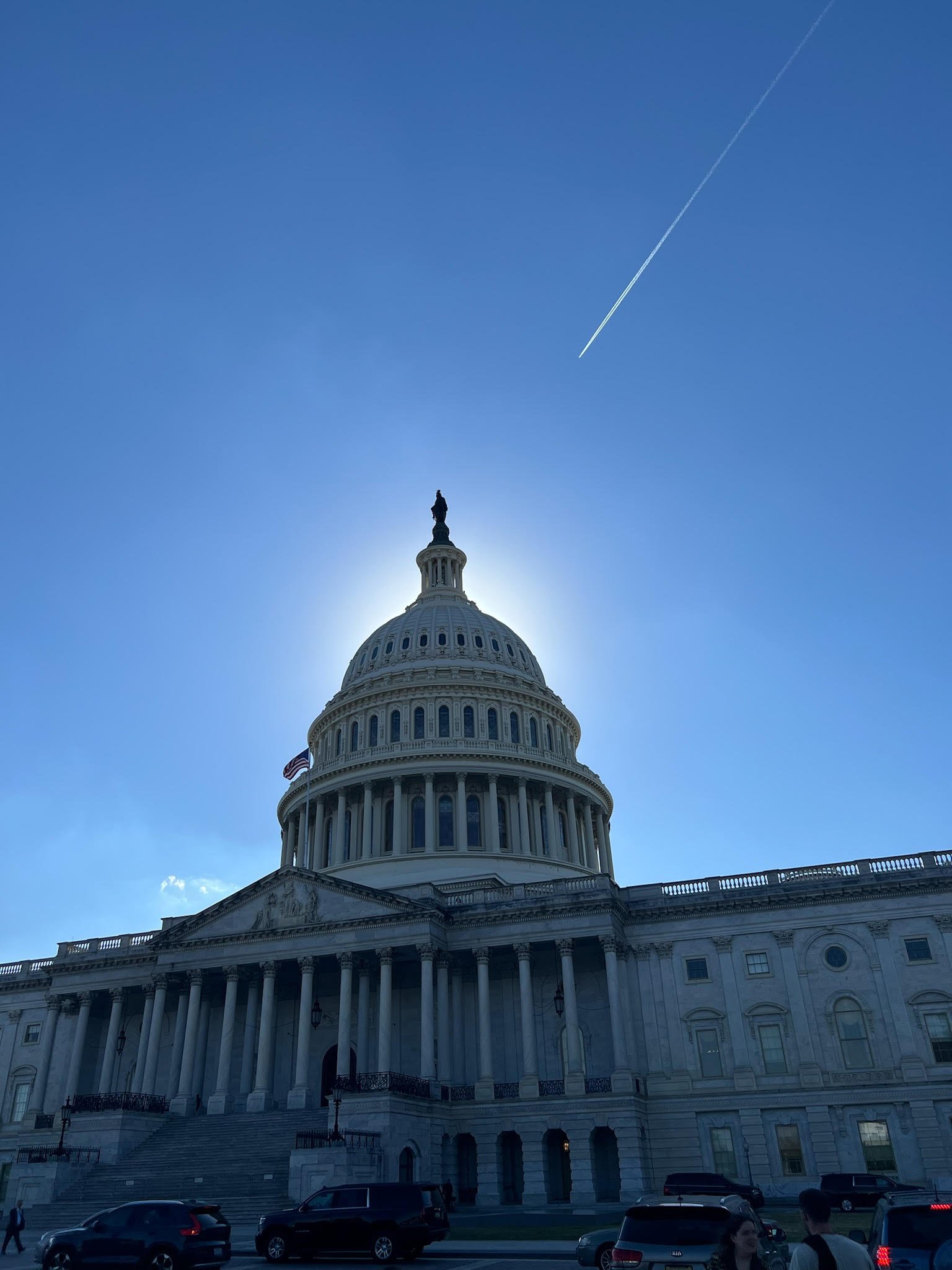 The Day is Done — As we celebrate 250 years, the Capitol in Washington DC reflects the culture, landscape, traditions, and everyday experiences that make America meaningful by depicting the waving US flag, the steps many have climbed to capture memor