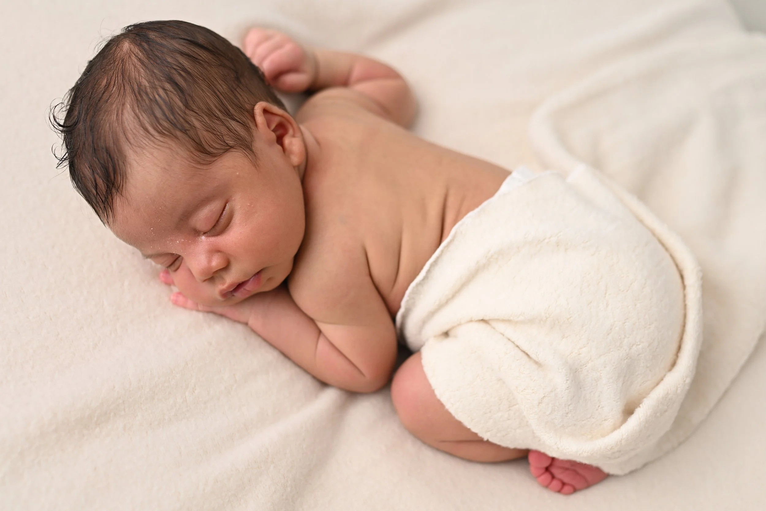 Baby boy photographed at Beachside Portraits in Satellite Beach Florida