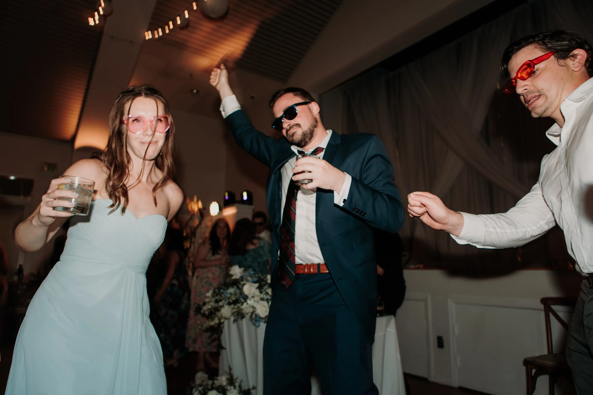 Candid photos of a wedding at The Wedding Bowl and Cuvier Club in La Jolla. San Diego wedding photography by Indigo West Photography.