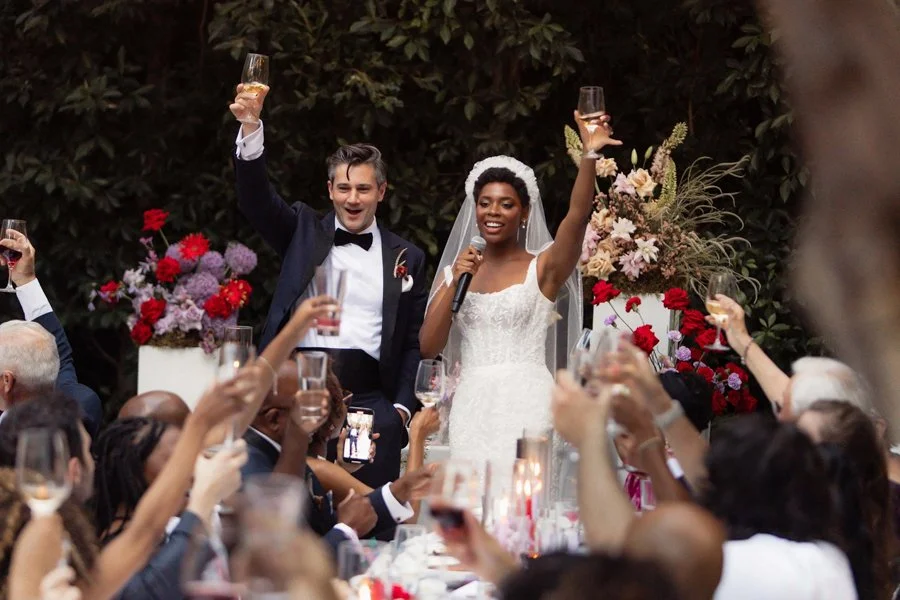 Couple toasts at their wedding reception at Redbird, Los Angeles