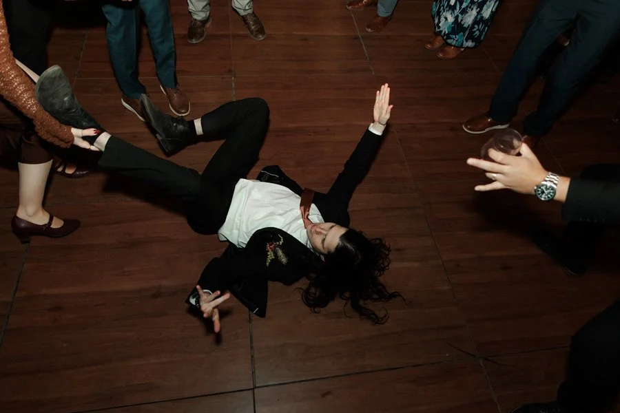 Groom dancing at his San Diego wedding.