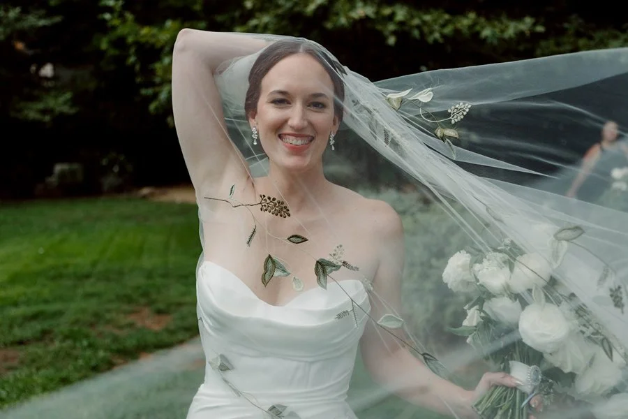 Bride holds her vail at a Los Angeles wedding ceremony.