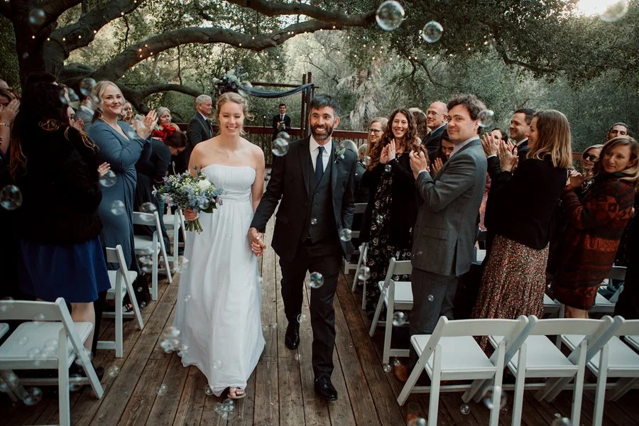 Couple exits their wedding ceremony at the 1909 in Topanga
