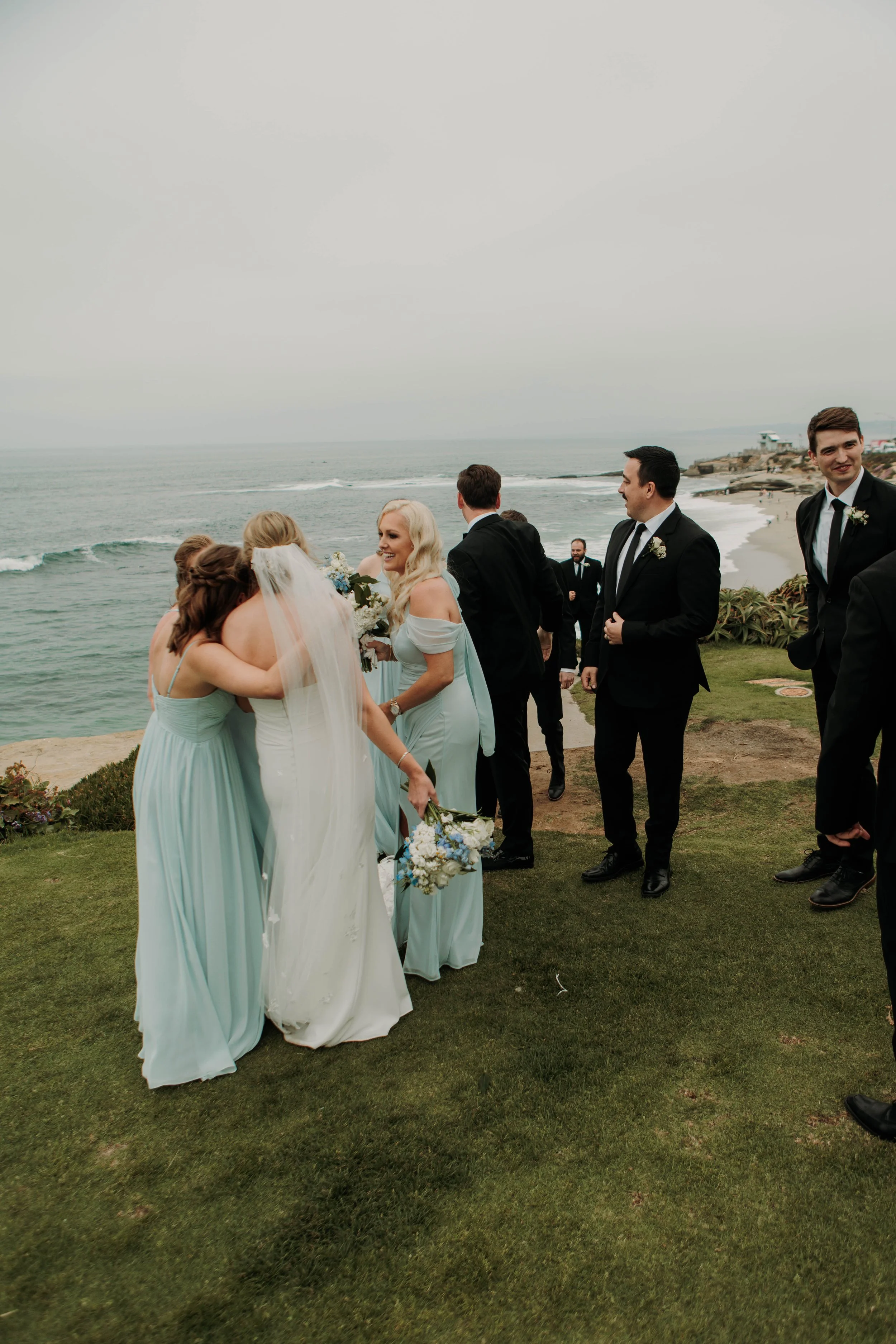 Candid photos of a wedding at The Wedding Bowl and Cuvier Club in La Jolla. San Diego wedding photography by Indigo West Photography.
