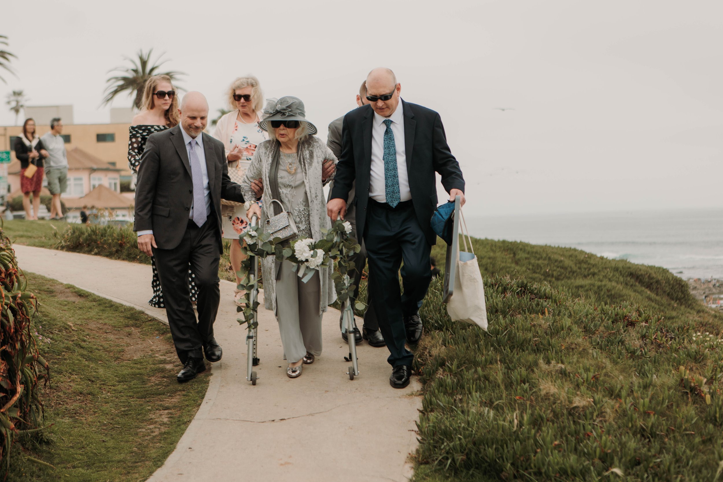 Candid photos of a wedding at The Wedding Bowl and Cuvier Club in La Jolla. San Diego wedding photography by Indigo West Photography.