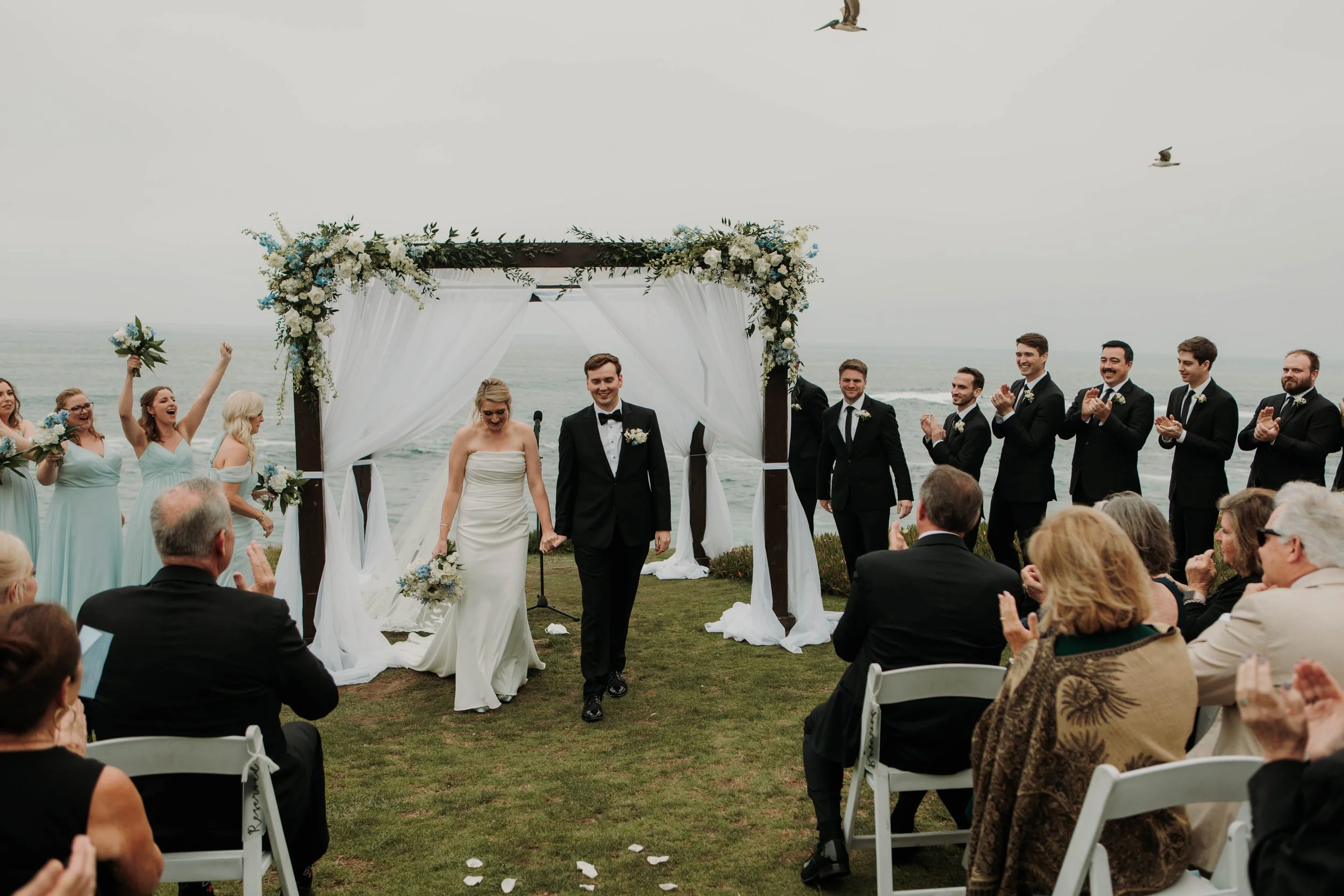 Candid photos of a wedding at The Wedding Bowl and Cuvier Club in La Jolla. San Diego wedding photography by Indigo West Photography.