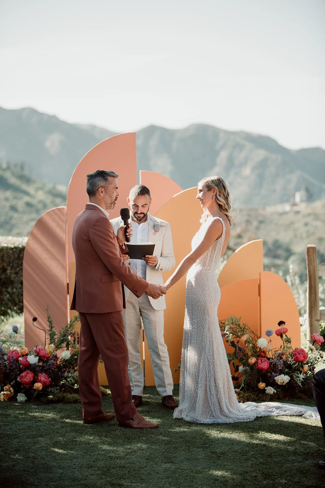 Bride and groom share vows at their San Diego wedding ceremony.
