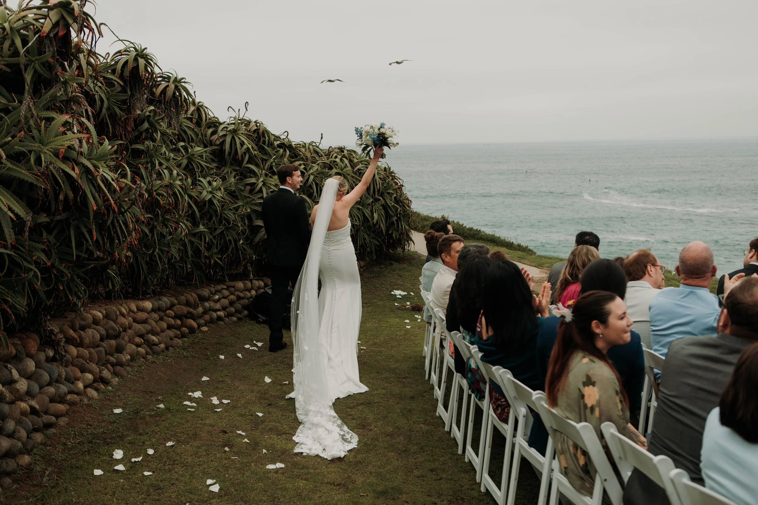 Candid photos of a wedding at The Wedding Bowl and Cuvier Club in La Jolla. San Diego wedding photography by Indigo West Photography.