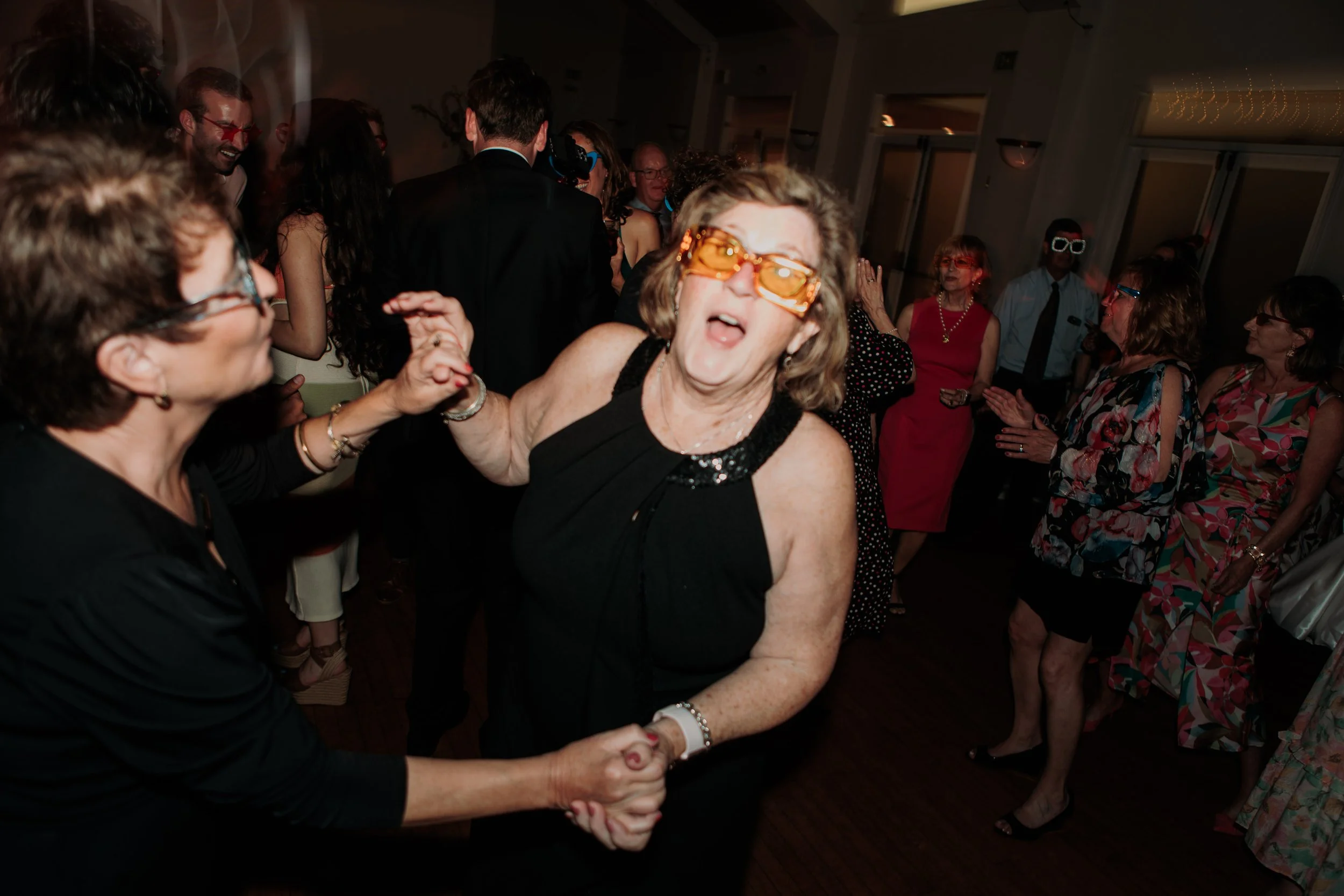 Candid photos of a wedding at The Wedding Bowl and Cuvier Club in La Jolla. San Diego wedding photography by Indigo West Photography.