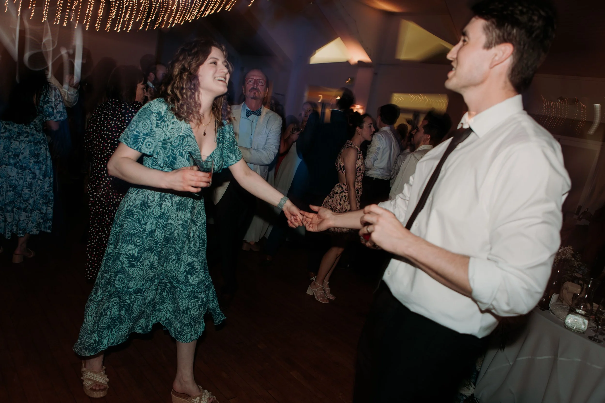 Candid photos of a wedding at The Wedding Bowl and Cuvier Club in La Jolla. San Diego wedding photography by Indigo West Photography.