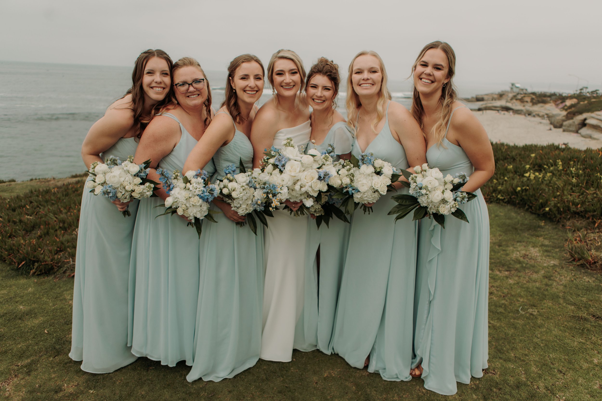 Candid photos of a wedding at The Wedding Bowl and Cuvier Club in La Jolla. San Diego wedding photography by Indigo West Photography.