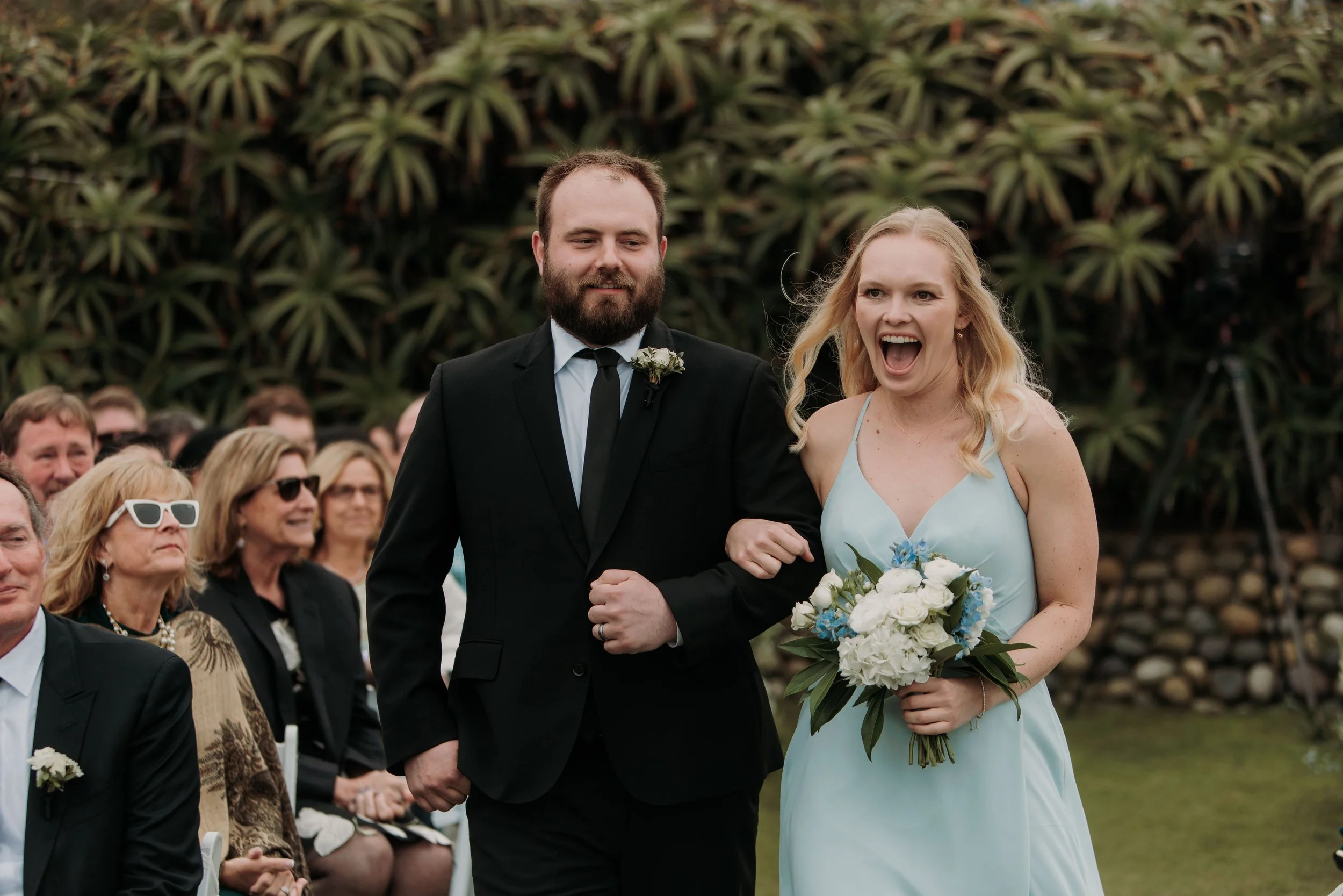 Candid photos of a wedding at The Wedding Bowl and Cuvier Club in La Jolla. San Diego wedding photography by Indigo West Photography.