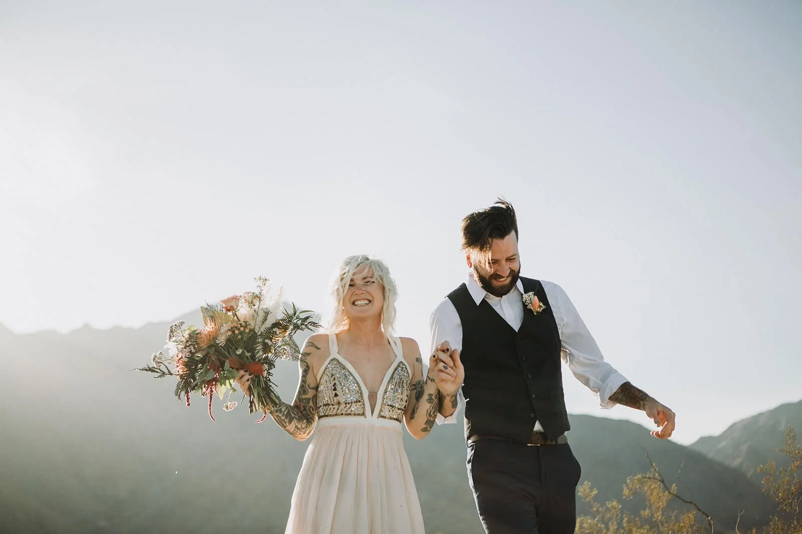 San Diego Couple smiles joyfully for their wedding ceremony.