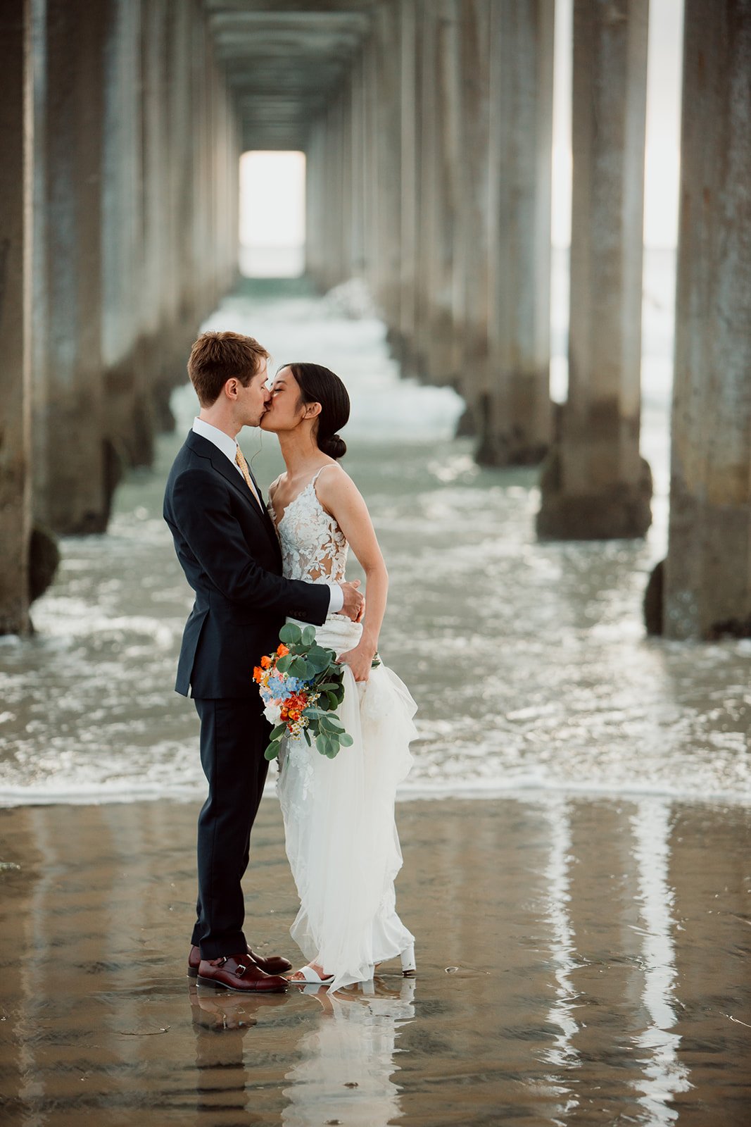 Wedding photo at Scripps Pier. San Diego top coastal venues.