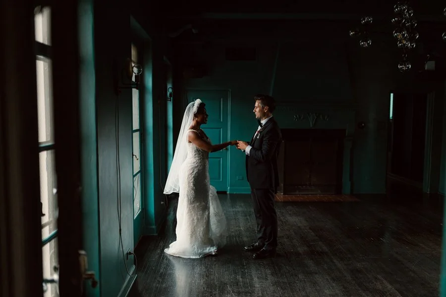 A couple takes a quiet moment for themselves during their wedding in San Diego.