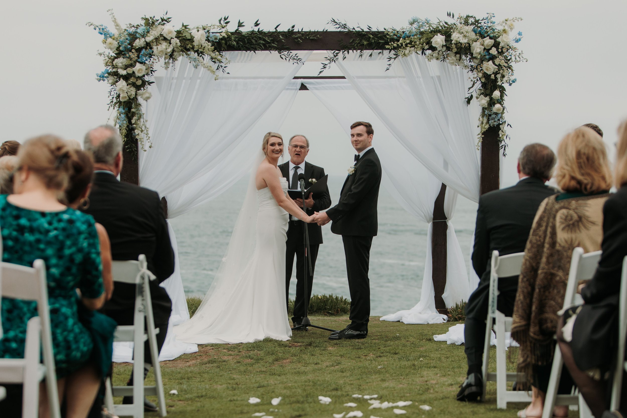 Candid photos of a wedding at The Wedding Bowl and Cuvier Club in La Jolla. San Diego wedding photography by Indigo West Photography.