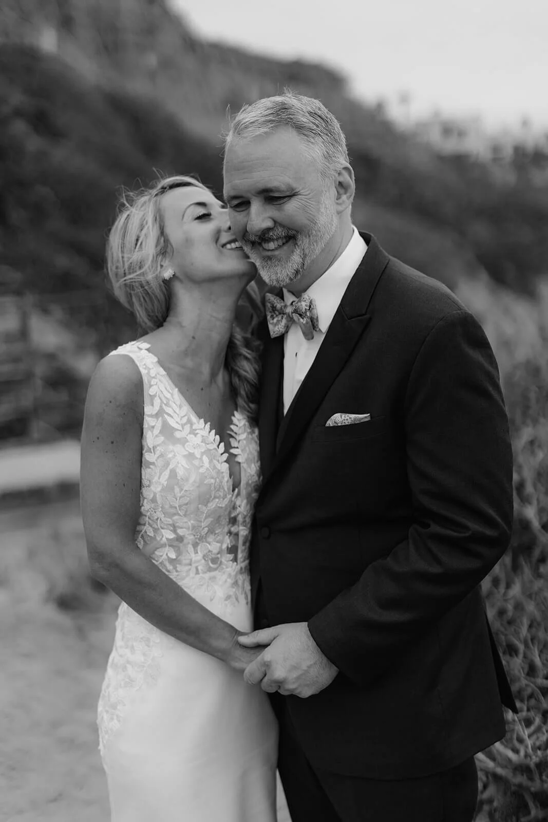San Diego courthouse wedding photos of couple at beach during golden hour after their San Diego courthouse ceremony.