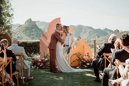 Elegant San Diego wedding ceremony first kiss.