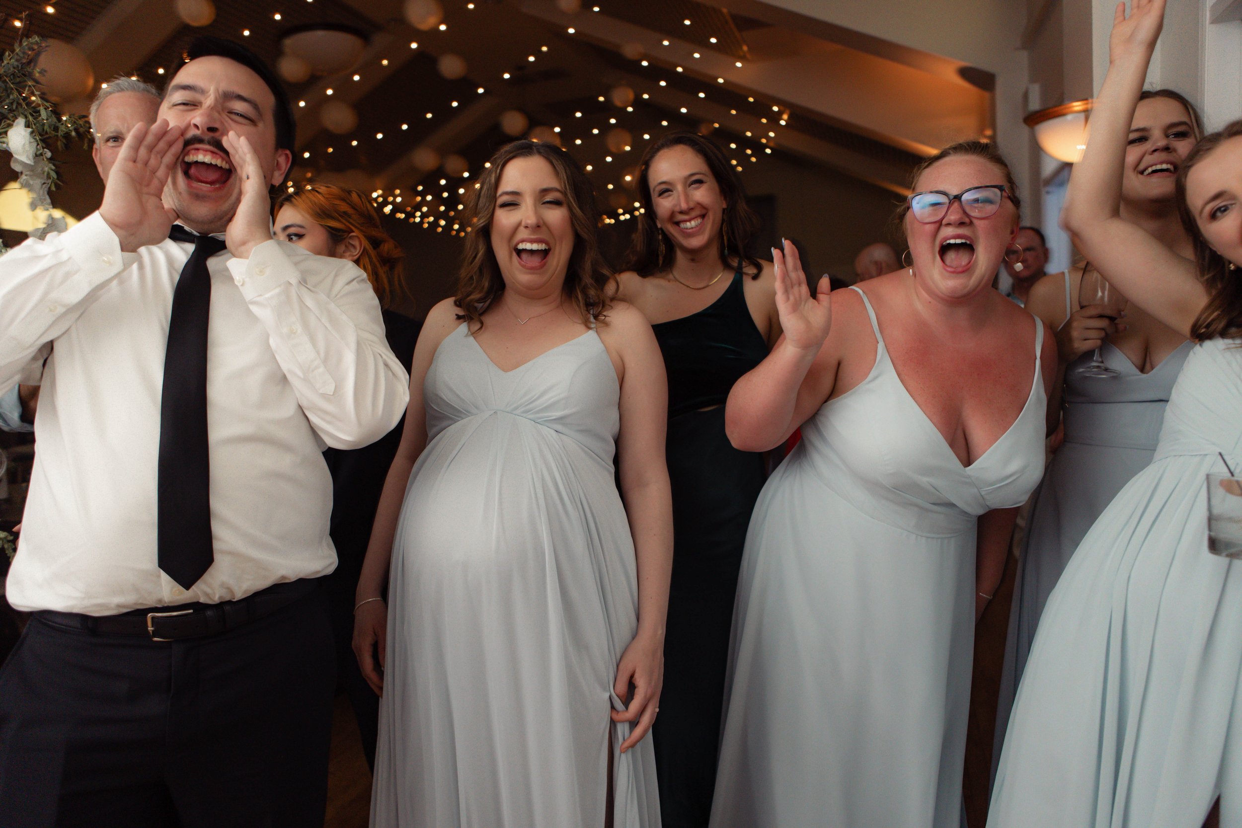 Candid photos of a wedding at The Wedding Bowl and Cuvier Club in La Jolla. San Diego wedding photography by Indigo West Photography.