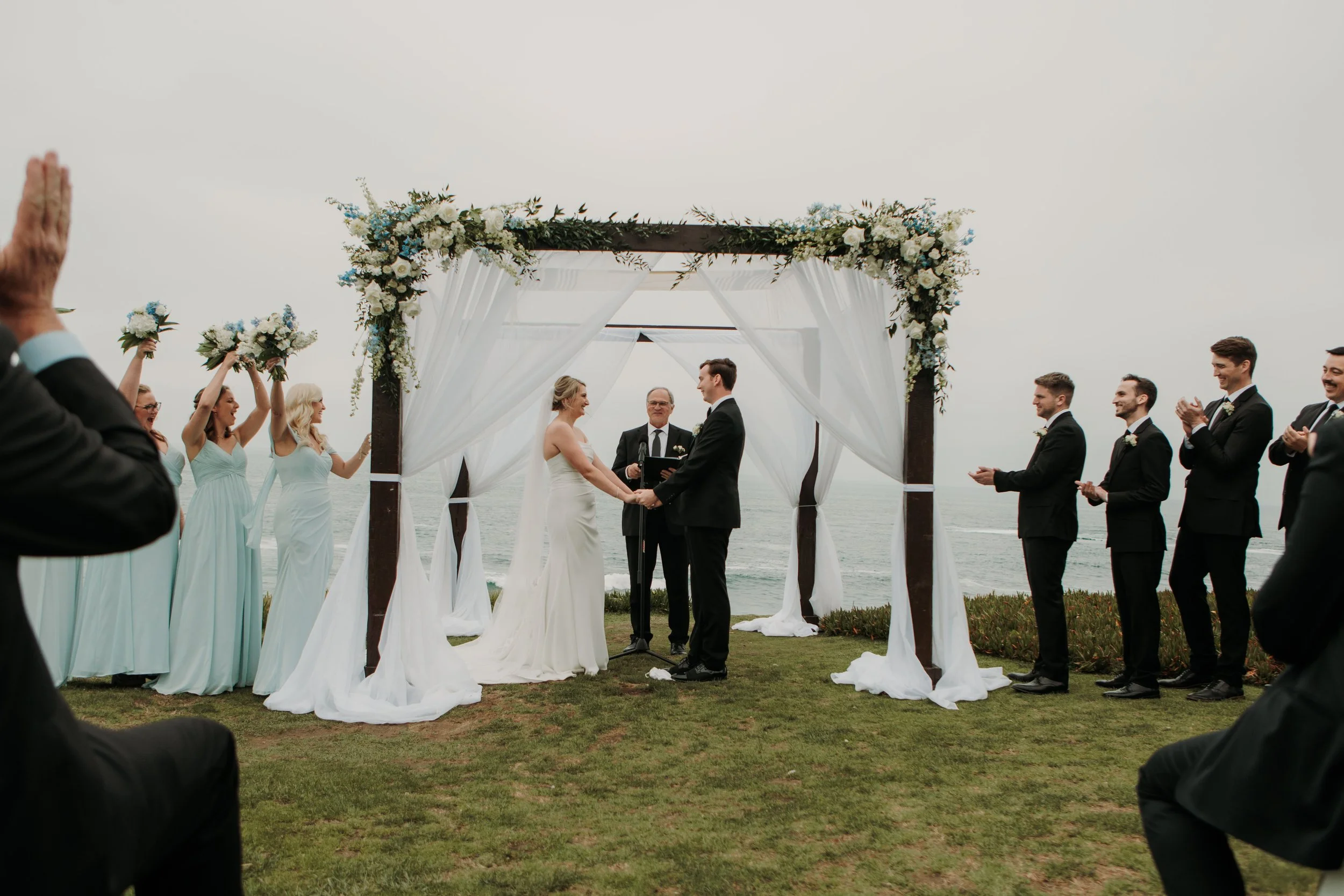 Candid photos of a wedding at The Wedding Bowl and Cuvier Club in La Jolla. San Diego wedding photography by Indigo West Photography.